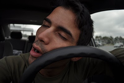 Mark sleeping on steering wheel